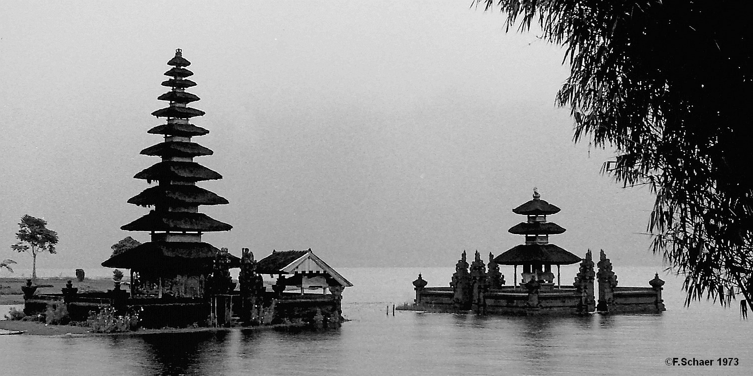 Horizonte 163.jpg - made long ago at one of our very early adventure-trips. It shows the Pura Ulun-Danu Temple beside Lake Bratan in central Bali (Indonesia)during a heavy tropical rain within the misty fog-covered mountains. ThisHindu-temple is one of the best known Landmark for the hinduistic Balinese.The old Kodachrome II-slide I've digitalized and converted to black and white.   click here for Google Maps View   Position: S08°16'30" E115°10'10", elev.1240m/4075ft Camera: Pentax Spotmatic 1,8/55mmm, date: January 1973