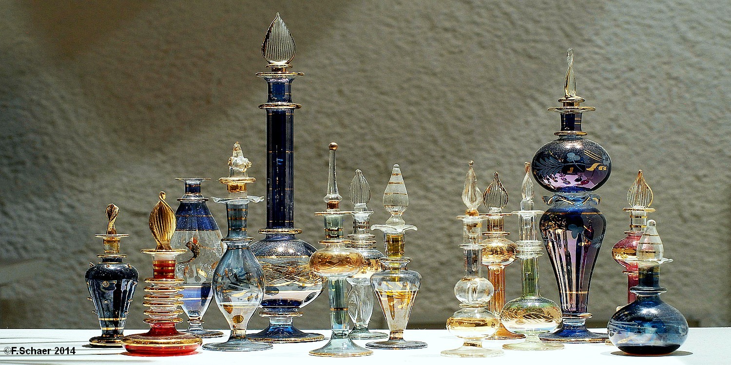 Horizonte 176.jpg - Ursi's collection of decrative scent-bottles,found on different trips in Marrakech (Moroc) and Djerba,(Tunesia) as well as in Istanbul (Turkey). But since about10 years we don't feel safe anymore in islamic countries...  Position: at our previous home in Switzerland Camera: Nikon D200, 50mm, 1,4, date07/01/2014